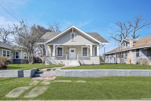 121 Harding, San Antonio, TX 78203 - view of front of property with a front lawn and a porch