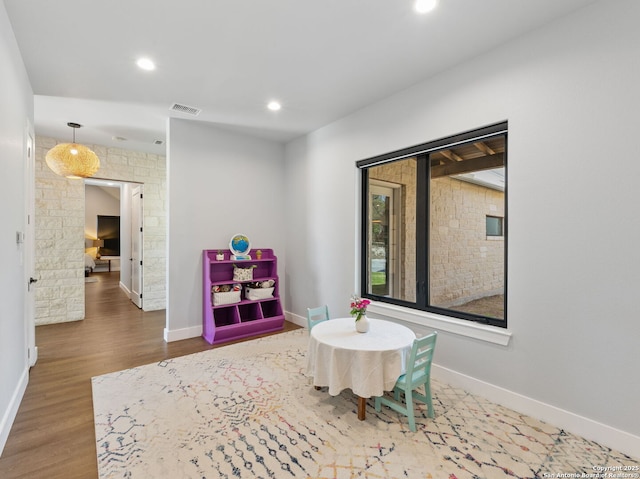 rec room featuring recessed lighting, visible vents, baseboards, and wood finished floors