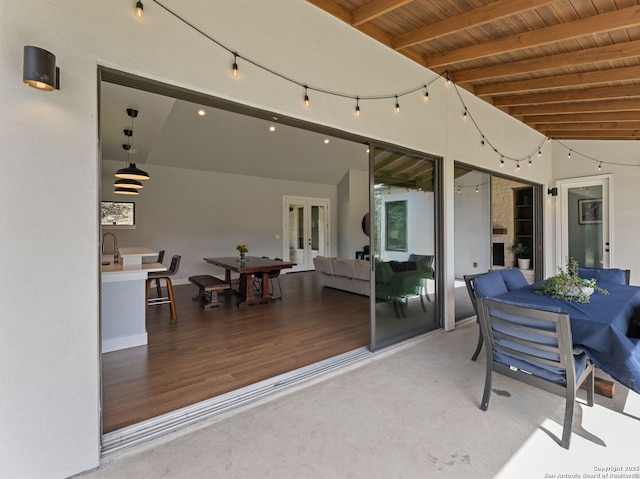 view of patio with french doors and outdoor dining area