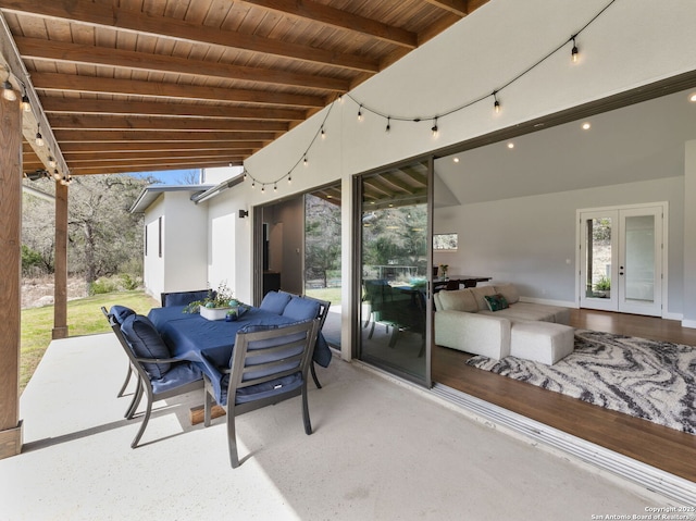 view of patio with french doors and outdoor dining area