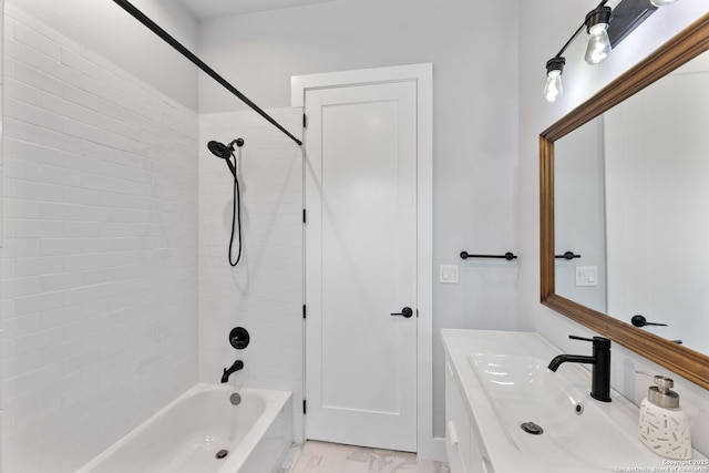 full bathroom featuring marble finish floor, bathtub / shower combination, and vanity