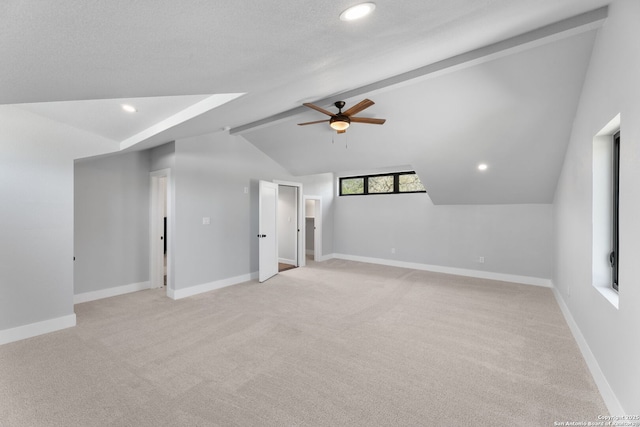 bonus room with lofted ceiling with beams, ceiling fan, recessed lighting, and baseboards