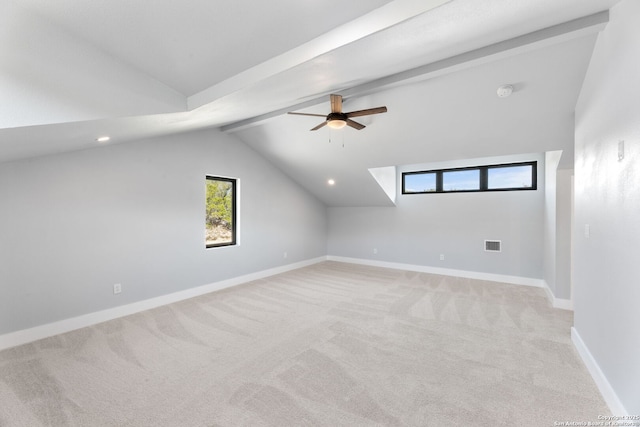 bonus room with baseboards, visible vents, a ceiling fan, light colored carpet, and lofted ceiling with beams