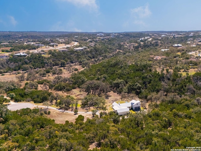 drone / aerial view with a forest view