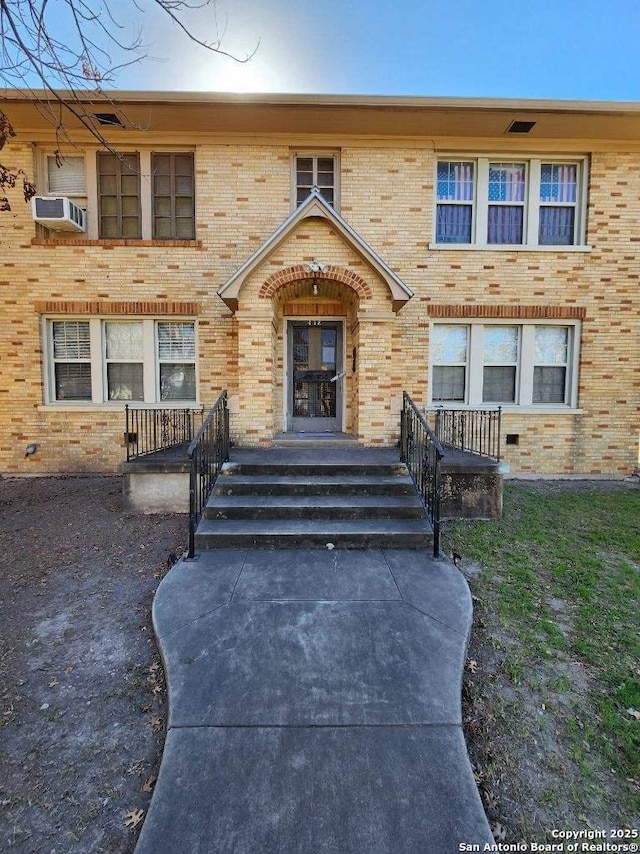 multi unit property featuring brick siding