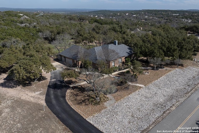 bird's eye view with a view of trees