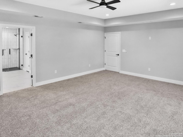 empty room featuring recessed lighting, carpet flooring, a ceiling fan, and baseboards