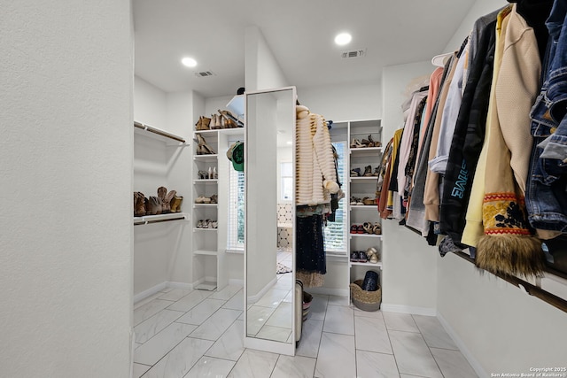 walk in closet featuring visible vents