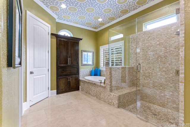 bathroom featuring ornamental molding, a stall shower, tile patterned flooring, and a bath