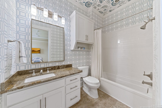 bathroom featuring shower / bath combination with curtain, vanity, toilet, and wallpapered walls