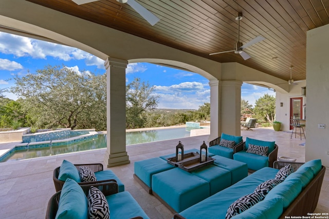 view of patio / terrace with a water view and an outdoor hangout area