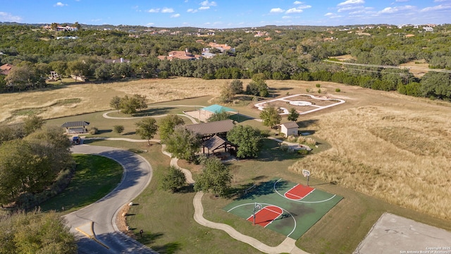 bird's eye view featuring a forest view