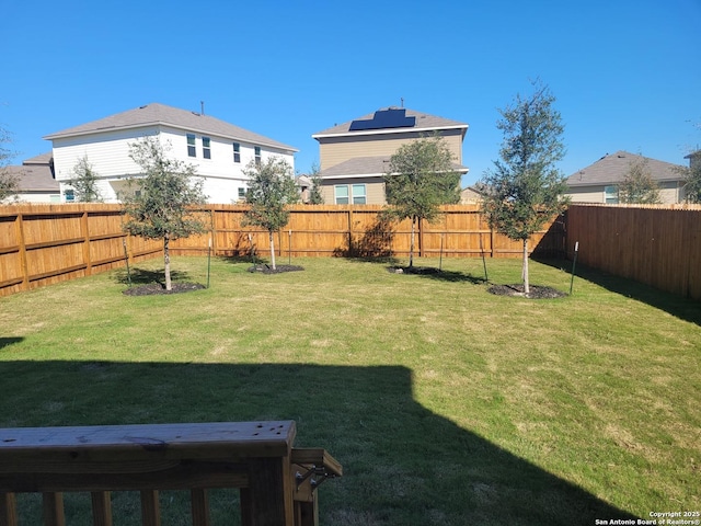 view of yard featuring a fenced backyard