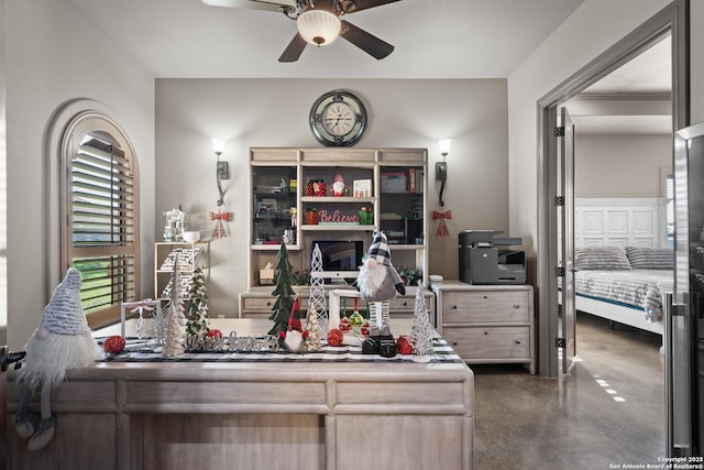 office featuring ceiling fan and concrete floors