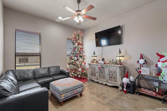 living room featuring a ceiling fan