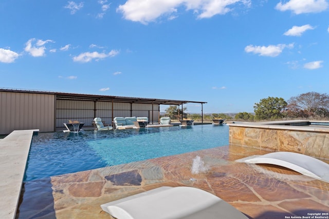 view of swimming pool featuring an outdoor living space