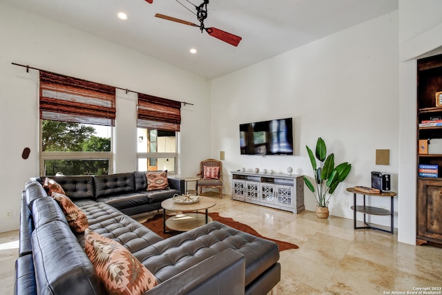 living area featuring ceiling fan and recessed lighting