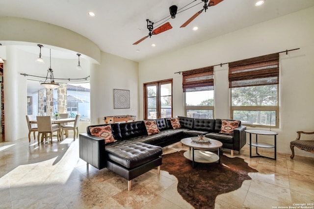 living area featuring recessed lighting and ceiling fan