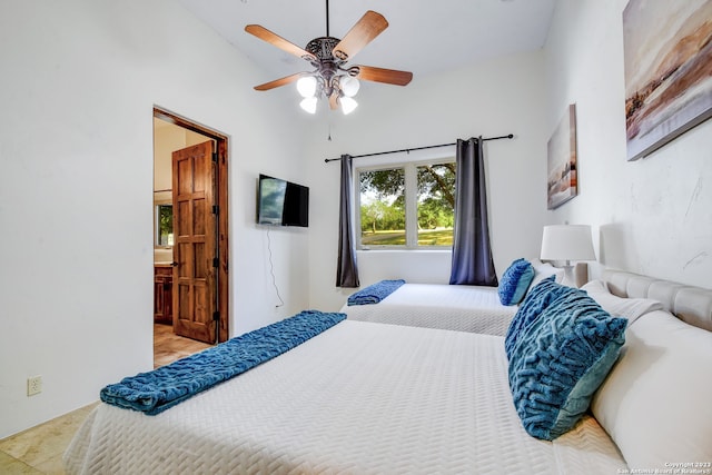 bedroom featuring lofted ceiling and ceiling fan