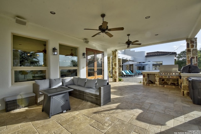 view of patio / terrace with outdoor lounge area, french doors, grilling area, and a ceiling fan