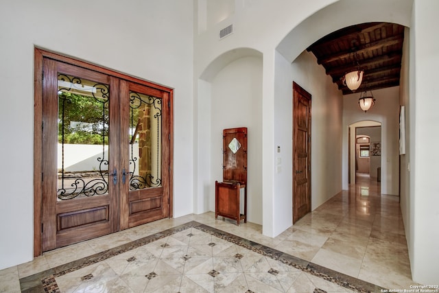 interior space featuring french doors and visible vents