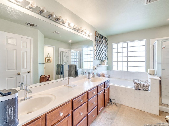 full bath with a stall shower, visible vents, a sink, and a bath