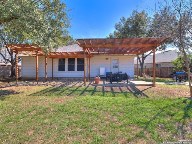 rear view of house featuring a patio area, fence, a lawn, and a pergola