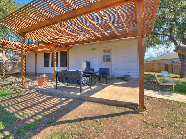 view of patio / terrace with fence and a pergola