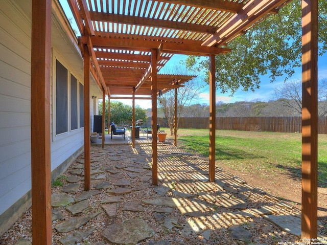 view of yard with a fenced backyard, a patio, and a pergola