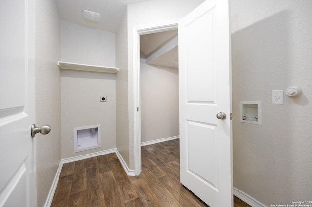 laundry area featuring dark wood finished floors, hookup for a washing machine, electric dryer hookup, laundry area, and baseboards