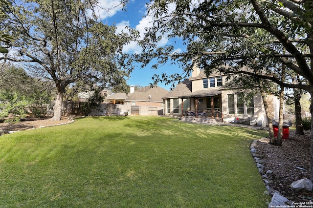 view of yard featuring a fenced backyard and a patio