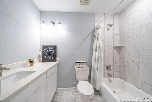 bathroom featuring toilet, visible vents, baseboards, marble finish floor, and shower / tub combo with curtain