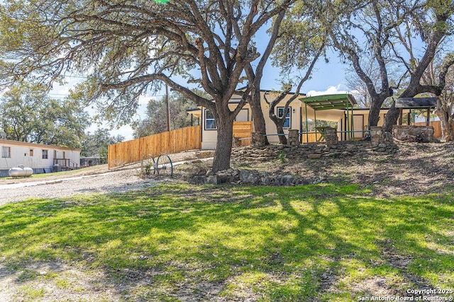 view of yard featuring fence