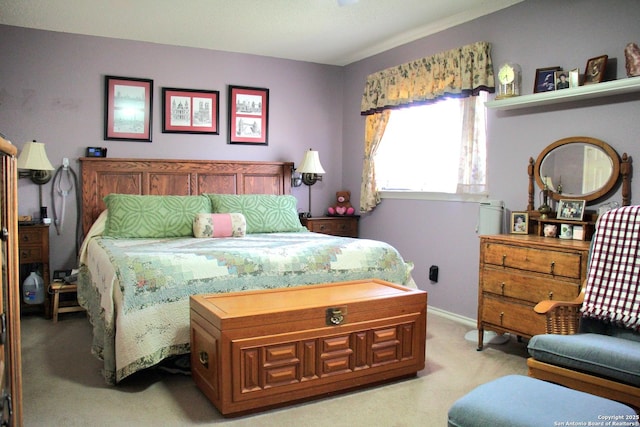 bedroom featuring light colored carpet