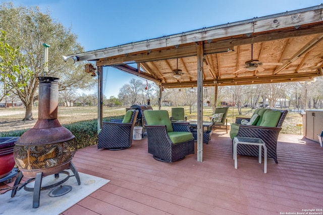 237 Heritage View Dr, Adkins, TX 78223 - wooden terrace with outdoor lounge area and a ceiling fan
