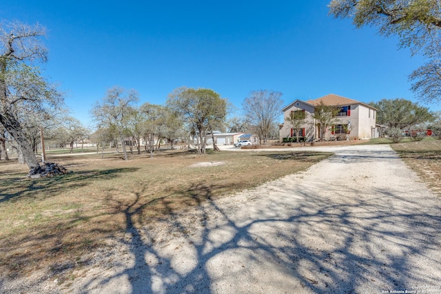 237 Heritage View Dr, Adkins, TX 78223 - view of yard with driveway