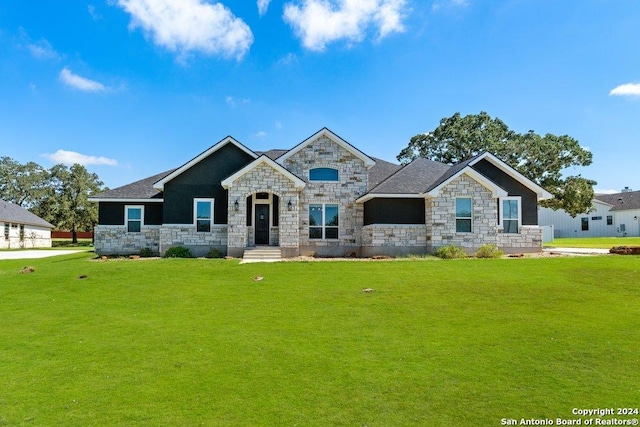 view of front of house with a front lawn