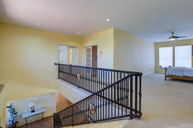 stairs with carpet flooring, recessed lighting, and baseboards