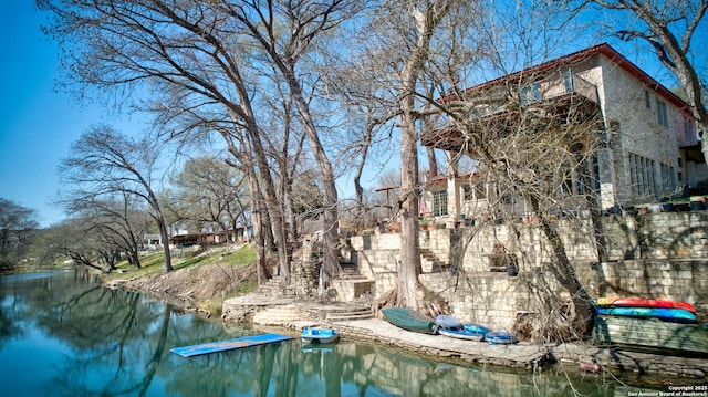 exterior space with a water view