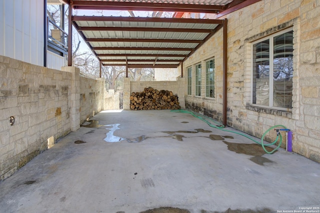 view of patio featuring fence