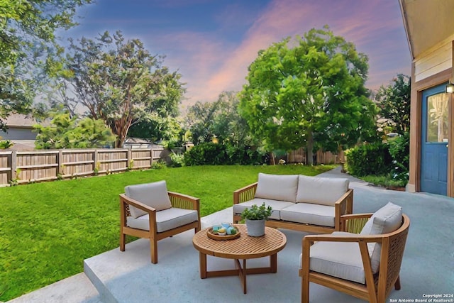 view of patio / terrace with a fenced backyard and an outdoor living space