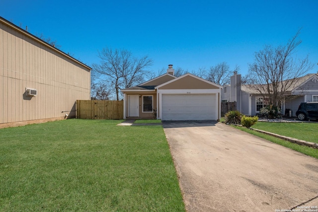 view of front of home with a garage, fence, concrete driveway, and a front yard