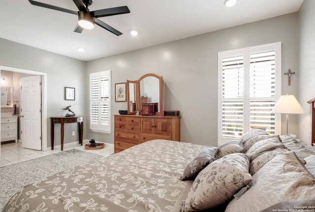 bedroom with multiple windows, tile patterned flooring, and recessed lighting