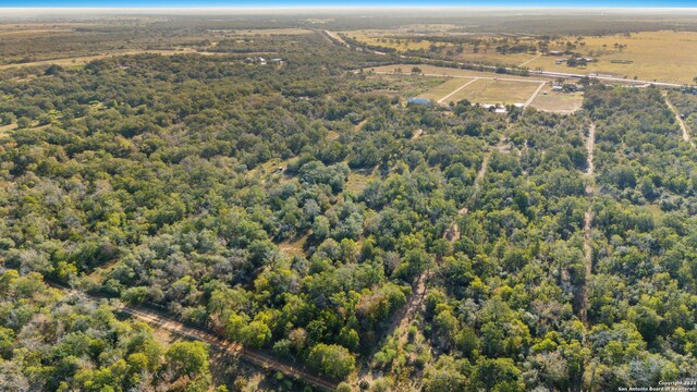 bird's eye view featuring a forest view