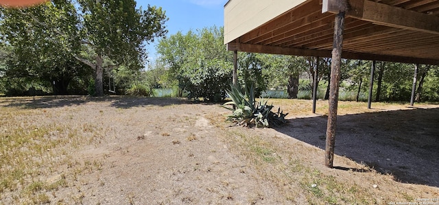 view of yard featuring a carport