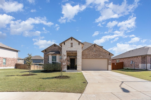 french provincial home featuring a garage, a front yard, fence, and brick siding