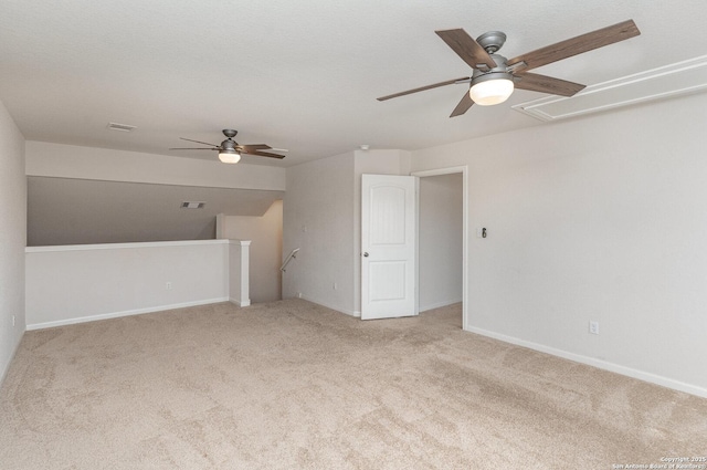 bonus room featuring attic access, baseboards, visible vents, a ceiling fan, and carpet