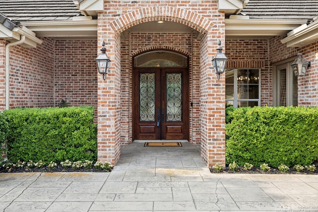 37 Westerleigh, San Antonio, TX 78218 - entrance to property featuring brick siding and french doors