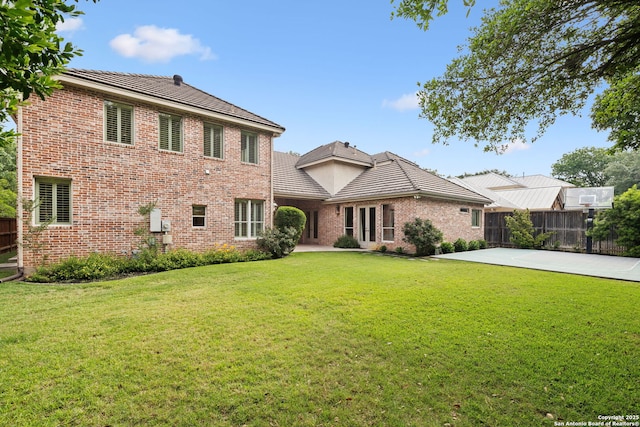 37 Westerleigh, San Antonio, TX 78218 - view of front of home featuring a tiled roof, brick siding, and a patio