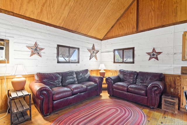 living area with wooden ceiling, vaulted ceiling, and hardwood / wood-style floors